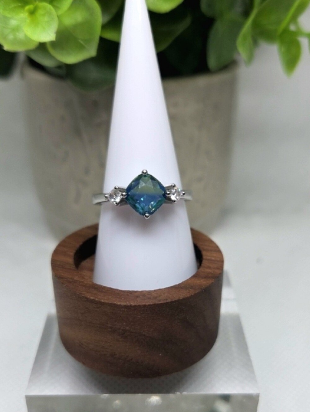 BP Blue Cushion-Cut Solitaire Ring with ClearAccent Stones